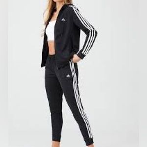 Adidas track suit.